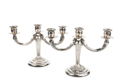 Lot 682 - A pair of Peruvian silver three light...