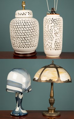 Lot 252 - A cast metal table lamp with domed glass shade...