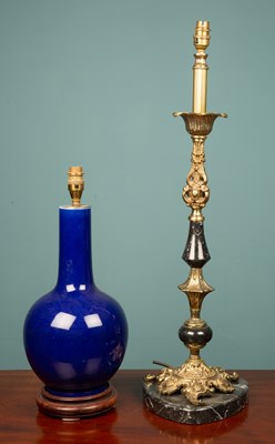 Lot 253 - An Oriental porcelain blue lazed table lamp on...