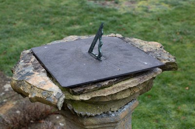 Lot 1148 - A Regency Coade stone sundial