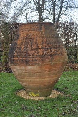 Lot 1111 - A large terracotta pithoi jar