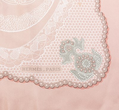 Lot 136 - A 'Doigts de Fée' silk scarf by Hermès,...