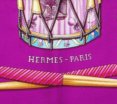 Lot 138 - A 'Les Tambours' silk scarf by Hermès,...