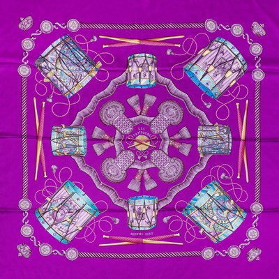 Lot 138 - A 'Les Tambours' silk scarf by Hermès,...