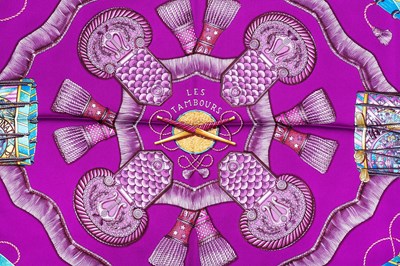 Lot 138 - A 'Les Tambours' silk scarf by Hermès,...