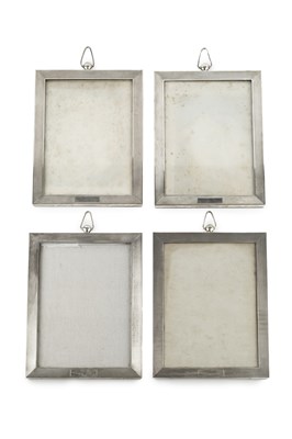 Lot 554 - A set of four George V silver rectangular...