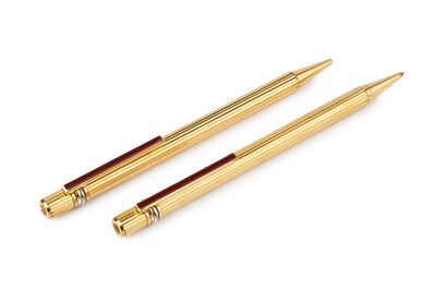 Lot 532 - A Must de Cartier gold plated ballpoint pen,...