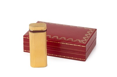 Lot 533 - A Must de Cartier gold plated lighter, with...