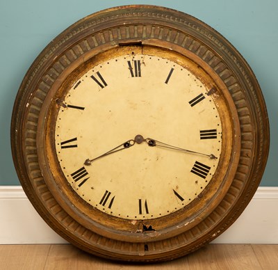 Lot 124 - A circular gilt wall clock, in need of...