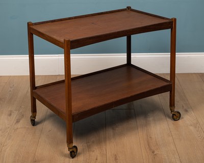 Lot 487 - A mid 20th century teak drinks trolley