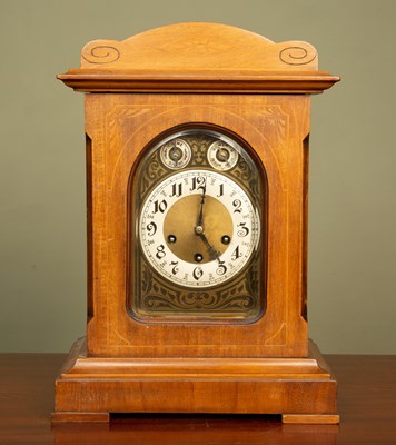 Lot 271 - Two walnut-cased mantle clocks, the larger...