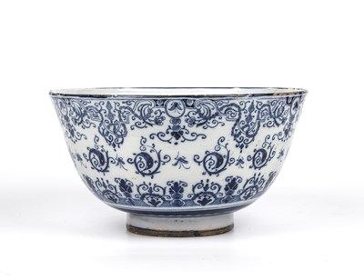 Lot 323 - An antique Dutch delft punch bowl with blue...