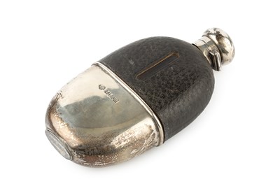 Lot 169 - A late Victorian silver mounted hip flask, of...