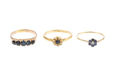 Lot 247 - Three sapphire set rings, comprising a cluster...