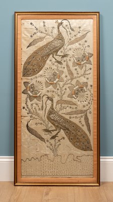 Lot 169 - An embroidered and beaded wall hanging...