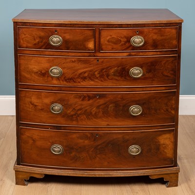 Lot 263 - A 19th century mahogany bow front chest, with...