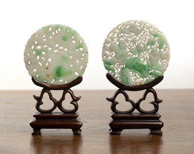 Lot 206 - Two disc form white and scattered green jade...