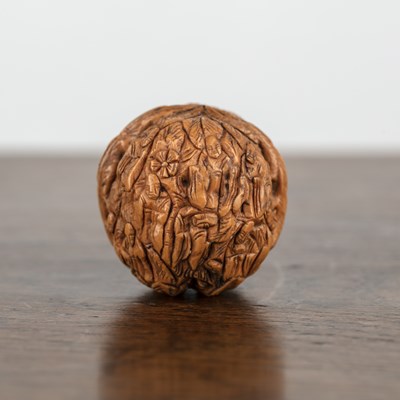 Lot 212 - Natural walnut Chinese, circa 1900 carved with...