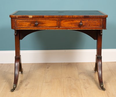 Lot 290 - An early 19th century mahogany writing table