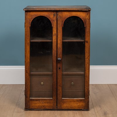 Lot 252 - An antique hardwood colletors cabinet