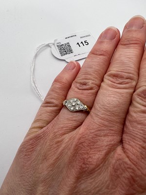 Lot 115 - A diamond panel ring, the lozenge-shaped panel...