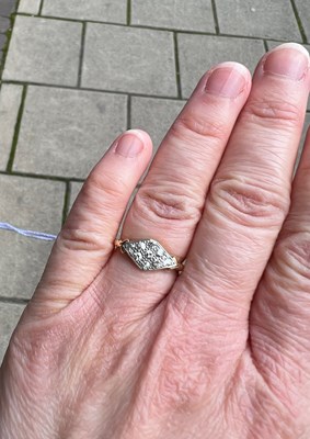 Lot 115 - A diamond panel ring, the lozenge-shaped panel...