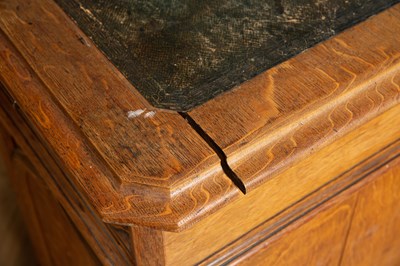 Lot 458 - A Victorian Gothic style oak partners desk