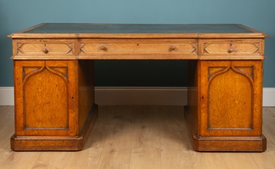 Lot 458 - A Victorian Gothic style oak partners desk