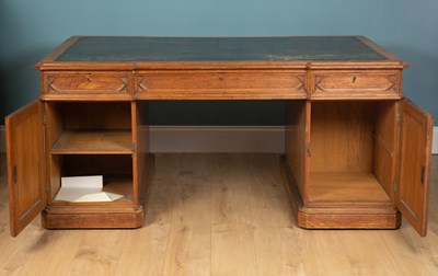 Lot 458 - A Victorian Gothic style oak partners desk