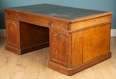 Lot 458 - A Victorian Gothic style oak partners desk