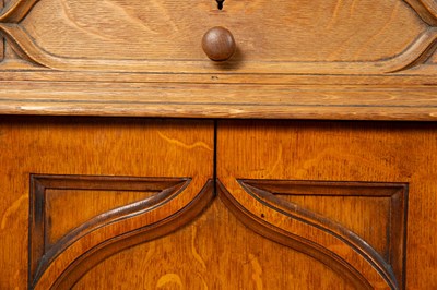 Lot 458 - A Victorian Gothic style oak partners desk