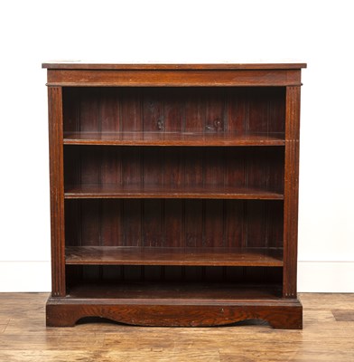 Lot 44 - Oak open front bookcase with three height...