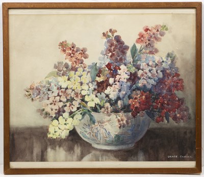 Lot 600 - English school, figure by a thatched cottage; a still life of flowers by Grace Carver and three others