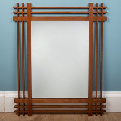 Lot 408 - A mid-century Italian, walnut wall mirror attributed to Ettore Sottsass