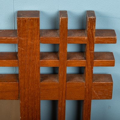 Lot 408 - A mid-century Italian, walnut wall mirror attributed to Ettore Sottsass