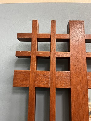 Lot 408 - A mid-century Italian, walnut wall mirror attributed to Ettore Sottsass