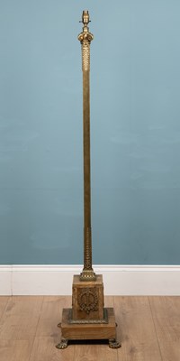 Lot 560 - An Italian style brass standard lamp