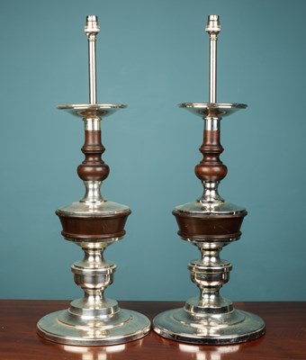 Lot 448 - A pair of large chrome and ebonised table lamps