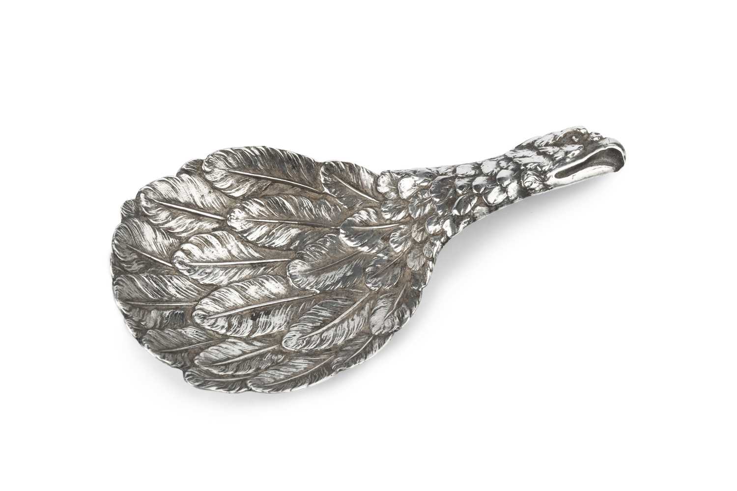 Lot 537 - A George III silver eagle's wing caddy spoon,...