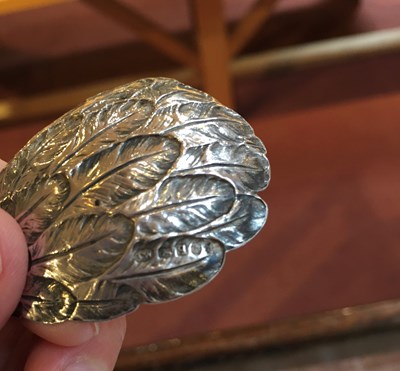 Lot 537 - A George III silver eagle's wing caddy spoon,...