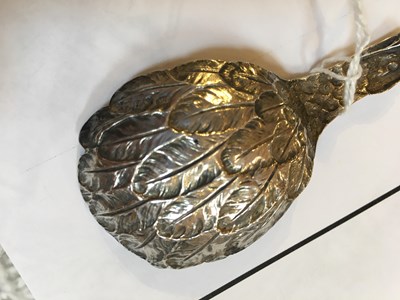 Lot 537 - A George III silver eagle's wing caddy spoon,...