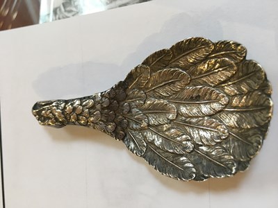 Lot 537 - A George III silver eagle's wing caddy spoon,...