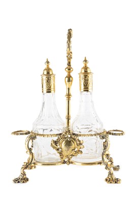 Lot 732 - A George III silver-gilt cruet stand, the...