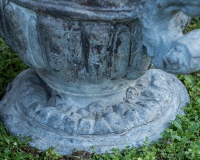 Lot 1094 - A pair of antique lead urns