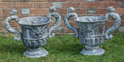 Lot 1094 - A pair of antique lead urns