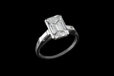Lot 146 - A diamond single stone ring, the emerald-cut...