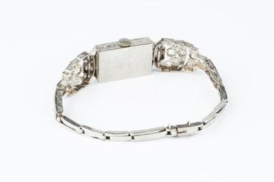 Lot 114 - A diamond cocktail watch, the rectangular...