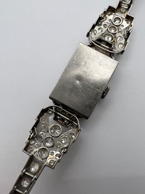 Lot 114 - A diamond cocktail watch, the rectangular...