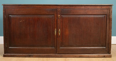 Lot 348 - An antique oak dresser base or side cabinet