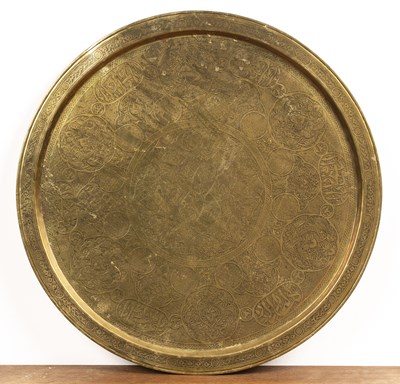 Lot 208 - Engraved brass tray Indo-Persian, with Koranic...